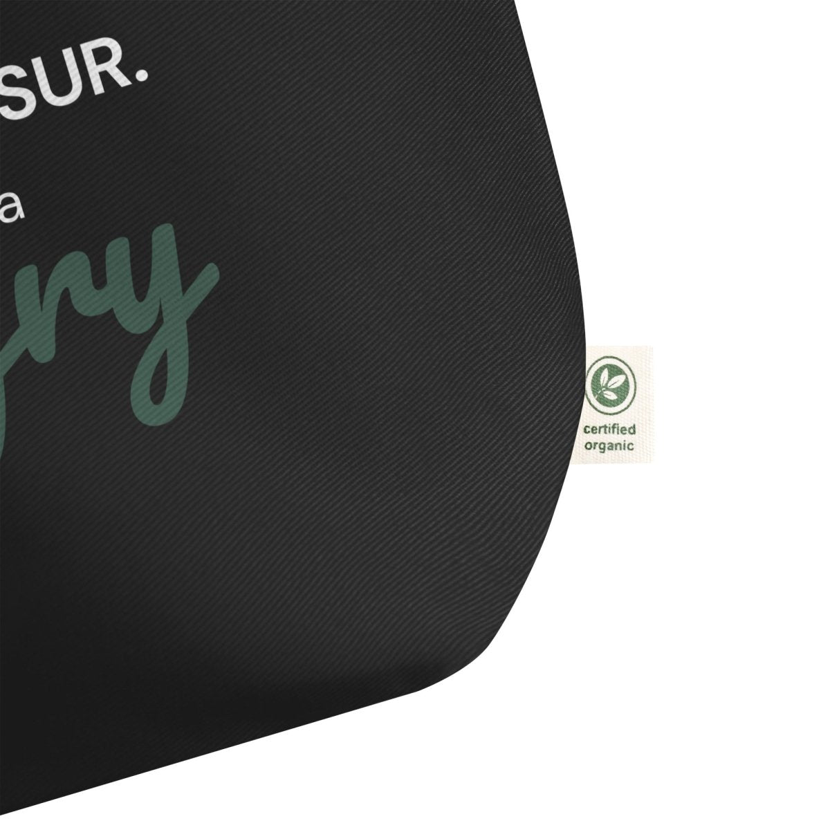 Svart tygpåse XL med hangry-tryck – närbild på certified organic.